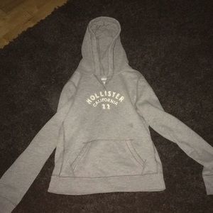 Gray with sewn on white letters hoodie